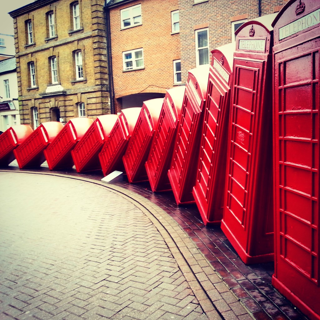 Leaning telephone boxes - art