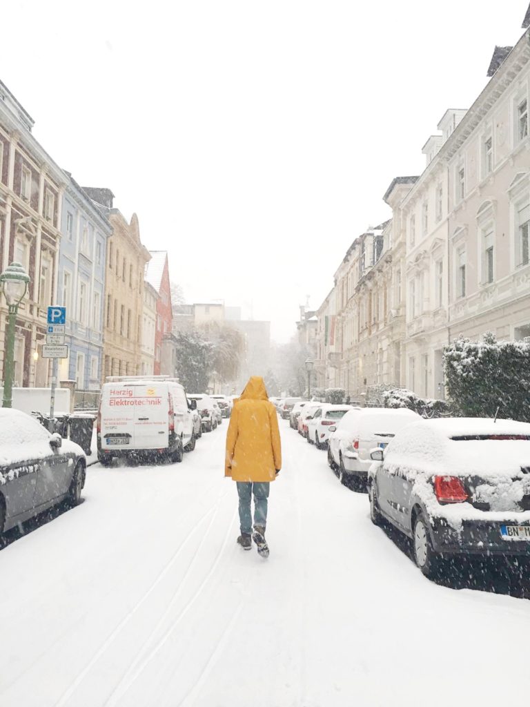 Yellow coat in snow - johnthego.com