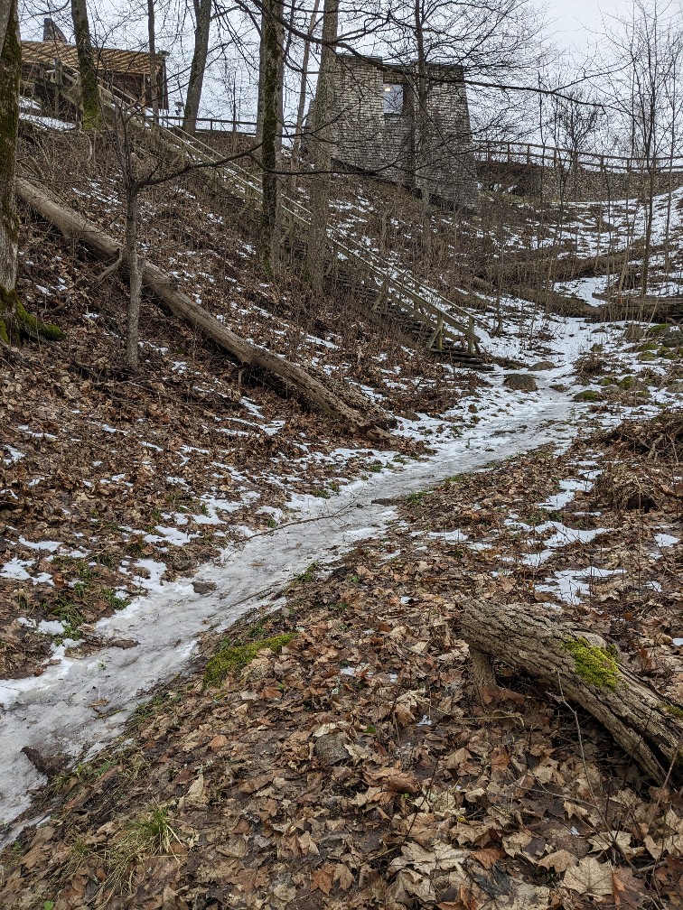 Hiking Gaujas National Park in winter - icy trail